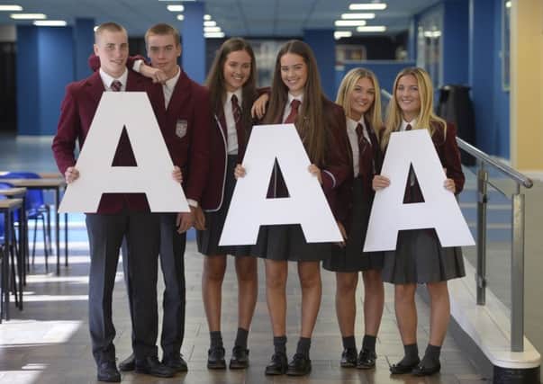 Three sets of twins at St Ninian's High School, East Renfrewshire, Scotland, who received 5As at Highers (from left to right; Joseph and Michael Lowrie, both 17, Emma and Vivien McAinish, both 17 and Roisin and Niamh Kelly, 16). Picture: SWNS