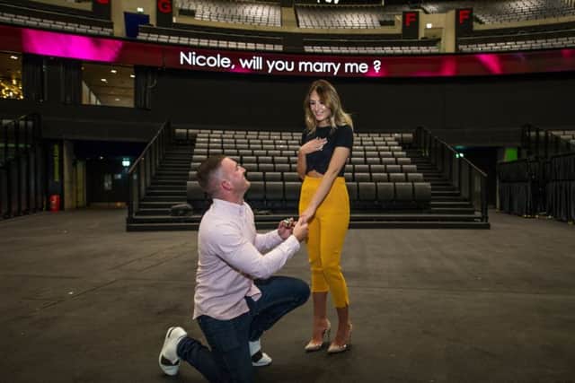 The proposal of Jamie McGuire (24) to Nicole Short (23). Picture: John Devlin