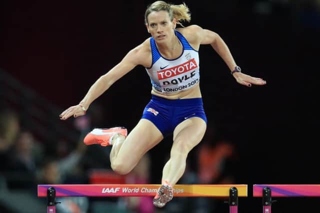 Eilidh Doyle clears a barrier on her way to third place in her 400m hurdles semi-final and qualification for the final as a fastest loser. Picture: Adam Davy/PA Wire