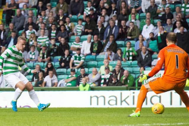 Celtic's Leigh Griffiths fires the third goal past Kilmarnock goalkeeper Jamie MacDonald. Picture: SNS/Alan Harvey