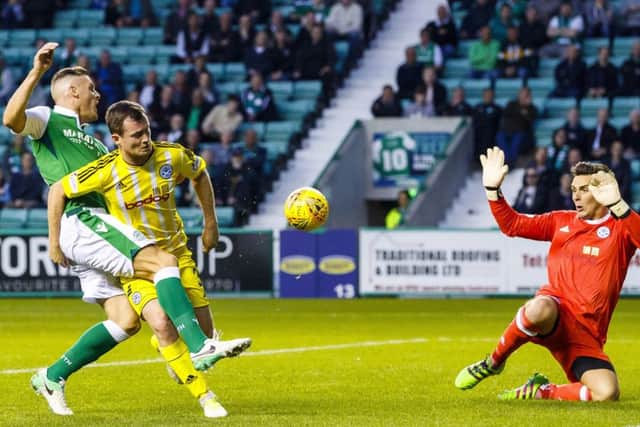 Anthony Stokes pounces to make it 3-0 to Hibs. Picture: Roddy Scott/SNS