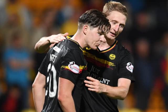 08/08/17 BETFRED CUP 
 ST JOHNSTONE v PARTICK THISTLE
 MCDIARMID PARK - PERTH
 Partick Thistle's Chris Erskine (R) celebrates with teammate Kevin Lisbet at full-time.