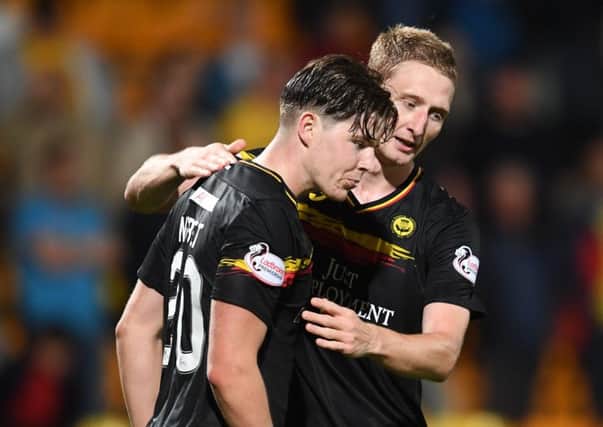 08/08/17 BETFRED CUP 
 ST JOHNSTONE v PARTICK THISTLE
 MCDIARMID PARK - PERTH
 Partick Thistle's Chris Erskine (R) celebrates with teammate Kevin Lisbet at full-time.