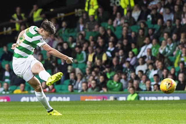 Celtic's Kieran Tierney fires in his goal from 40 yards. Picture: SNS