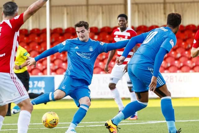 Kenny McLean scores what proved to be the winner for Aberdeen. Picture: SNS