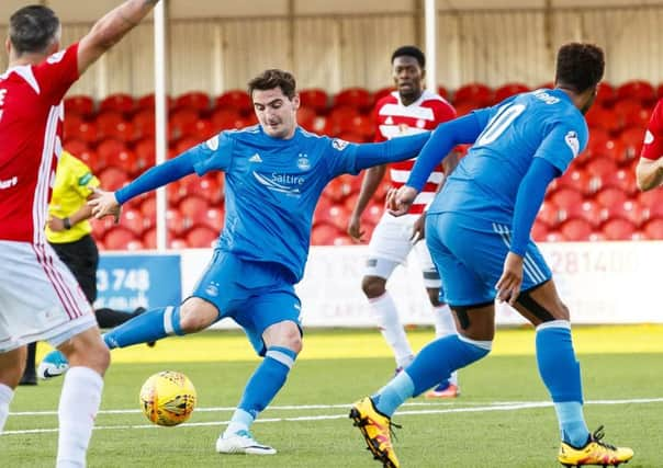 Kenny McLean scores what proved to be the winner for Aberdeen. Picture: SNS