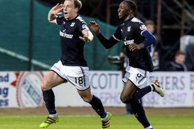 Dundee's Paul McGowan celebrates the winning goal against Dundee United in the Betfred Cup last 16. Dundee will now meet Celtic in the quarter-finals. Picture: Ross Parker/SNS