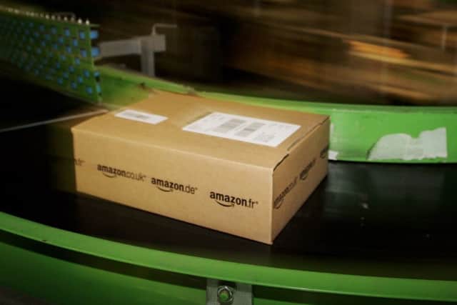 Amazon's UK corporation tax bill halved last year. Picture: Bruno Vincent/Getty Images