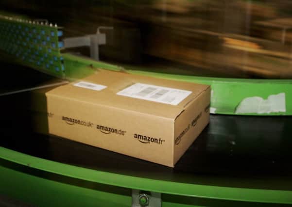 Amazon's UK corporation tax bill halved last year. Picture: Bruno Vincent/Getty Images