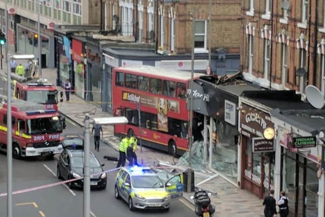 The scene in Lavender Hill, southwest London, after a bus left the road and hit a shop. Picture: Brendan Pfahlert/PA