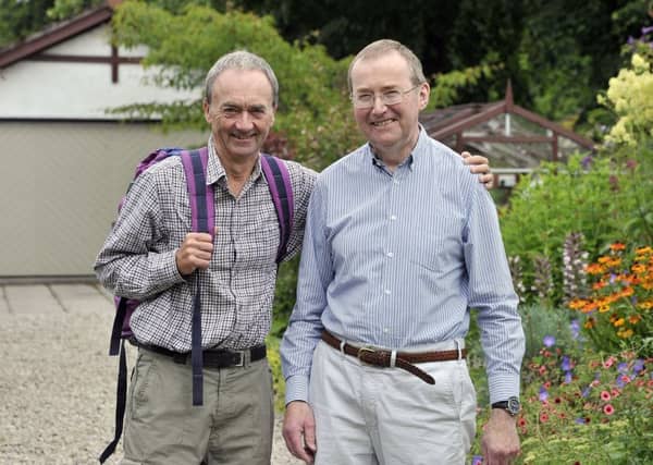 Frank McGavigan (right) who has Parkinson's disease, with fellow climber Clive Parker. Picture: SWNS