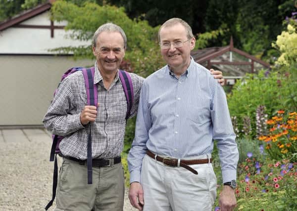Frank McGavigan (right) who has Parkinson's disease, with fellow climber Clive Parker. Picture: SWNS