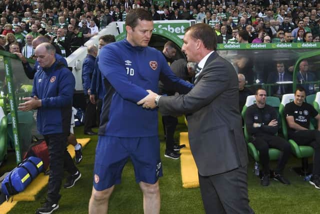 Jon Daly and Brendan Rodgers prior to Celtic's 4-1 defeat of Hearts. Picture: SNS