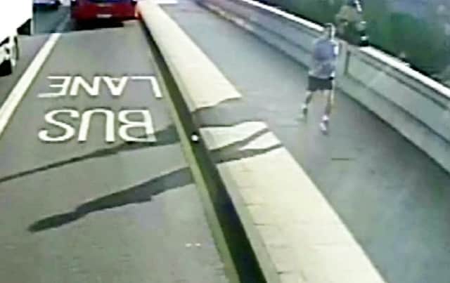 CCTV footage showing the jogger on Putney Bridge. Picture: SWNS