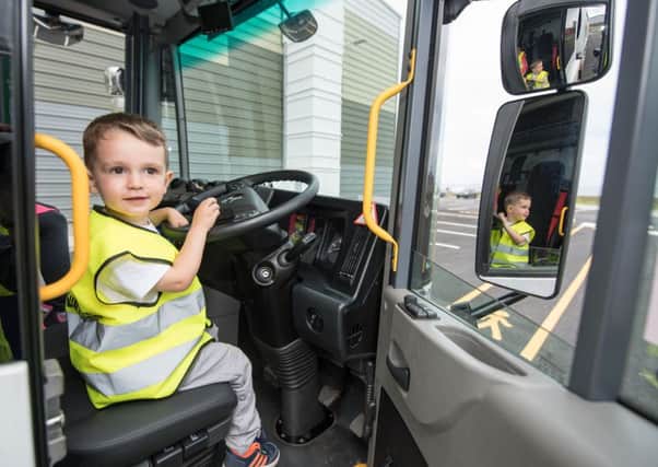 Kai in the bin lorry. Picture: Michal Wachucik/Aberdeen City Council