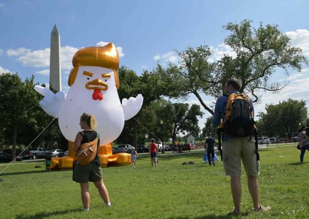 An inflatable version of Donald Trump as a chicken appeared outside the White House. Picture: AFP/Getty Images