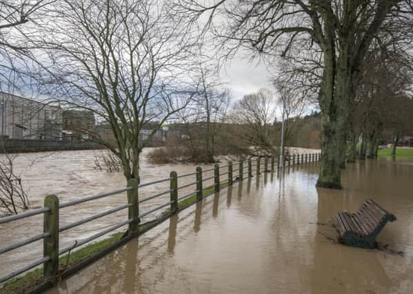 Scotland experienced major flooding during terrible weather two winters ago, when UK storms were officially titled for the first time. Naming storms is shown to raise awareness of impending extreme weather and encourage people to take action to protect themselves and their homes. Picture: Phil Wilkinson