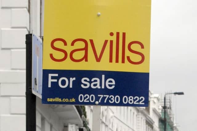 Savills said political and economic uncertainty were clouding the outlook for the property market. Picture: Ali Waggie/PA Wire