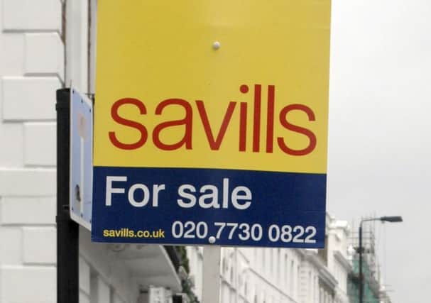 Savills said political and economic uncertainty were clouding the outlook for the property market. Picture: Ali Waggie/PA Wire