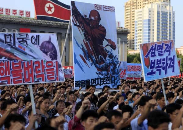 North Koreans rally in support of leader Kim Jong Un. Picture: Jon Chol Jin/AP