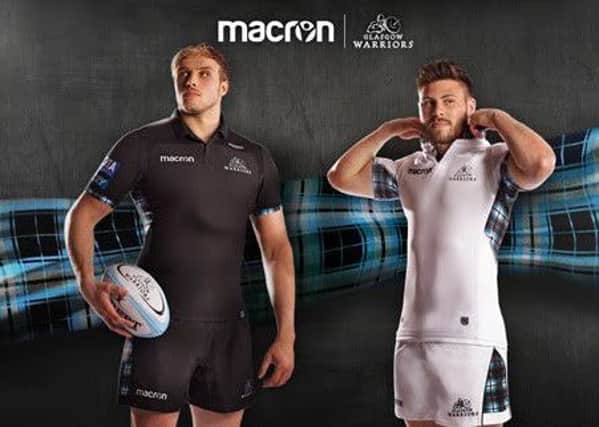 Ali Price and Jonny Gray model the new Glasgow Warriors kit which features the club tartan. Picture: Glasgow Warriors