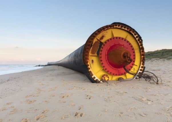 The huge tubes washed up on Winterton beach in Norfolk. Picture: SWNS