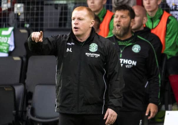 Neil Lennon is confident his Hibs side can thrive in the red-hot atmosphere of Ibrox. Picture: SNS/Bill Murray