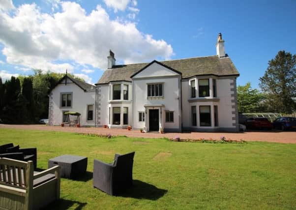 The luxurious home includes a swimming pool, sauna and an acre of private gardens.