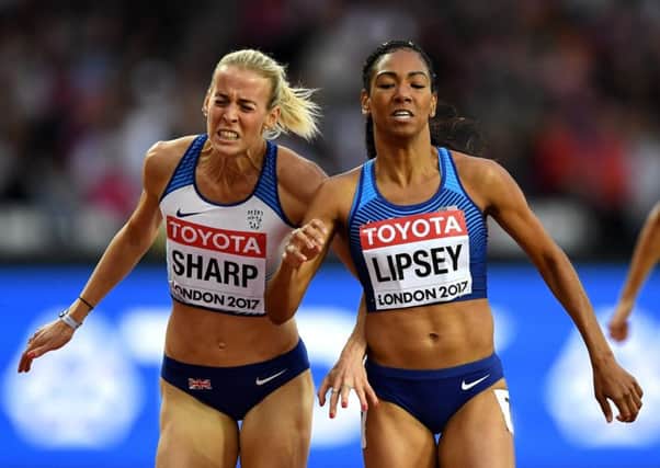 Lynsey Sharp and Charlene Lipsey of the United States battle at the finish line during the 800 metres semi finals at the World Athletics Championships. Picture: Matthias Hangst/Getty Images