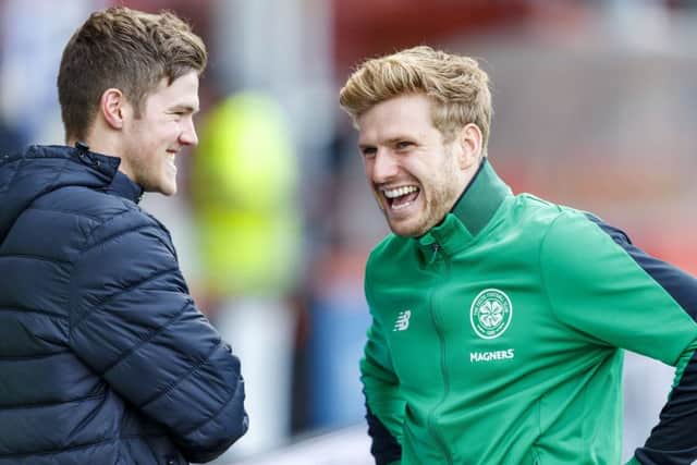 Stuart Armstrong, right, shares a joke with former Dundee United team-mate Blair Spittal before kick-off. Picture: SNS
