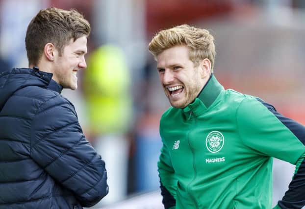 Stuart Armstrong, right, shares a joke with former Dundee United team-mate Blair Spittal before kick-off. Picture: SNS