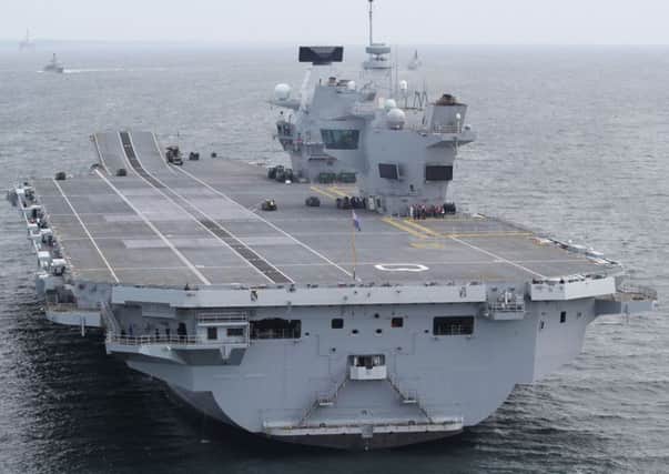 Royal Navy's new aircraft carrier HMS Queen Elizabeth during her maiden sea trials off the coast of Scotland. Picture: PA