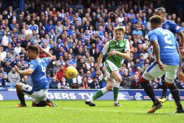 Hibs' Vykintas Slivka's shot finds the net via Rangers' James Tavernier. picture: SNS/Rob Casey