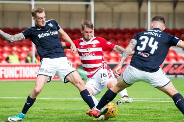Hamilton's David Templeton is brought down in the box and the penalty is awarded. Picture: SNS/Ross Parker