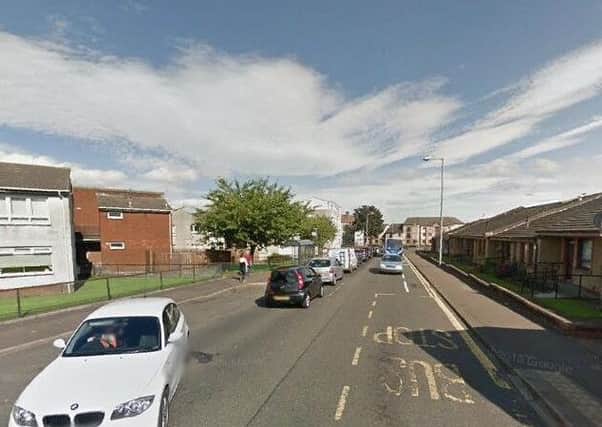 The men broke down the door of the flat in Witch Road, Kilmarnock. Picture: Google