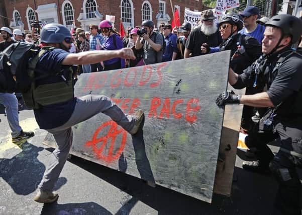 Protesters exchange insults at the pro-white rally, which became more confrontational. Photograph: Getty Images