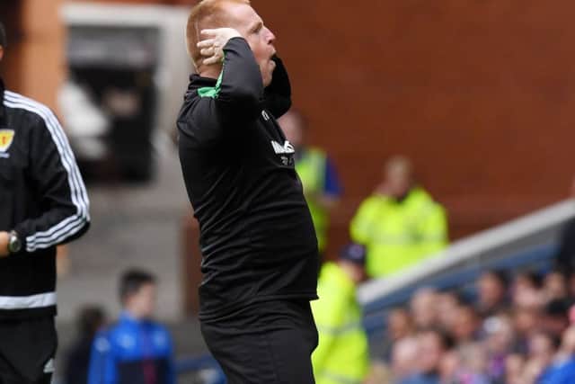 Neil Lennon enjoys himself after Hibs level at Ibrox. Picture: SNS/Alan Harvey
