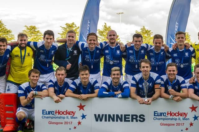 The Scotland squad are all smiles as they pose with their winners medals following yesterdays European Nations Championship II final victory over Wales at Glasgow Green. Photograph: Duncan Gray