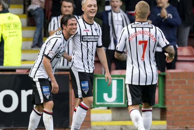 Dunfermline's Joe Cardle (left) celebrates his second goal. Picture: SNS/Bruce White