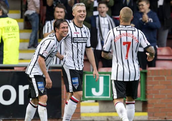 Dunfermline's Joe Cardle (left) celebrates his second goal. Picture: SNS/Bruce White