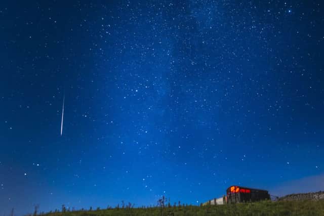 A meteor during the Perseid meteor shower seen from near Hawes in the Yorkshire Dales National Park. Picture: PA