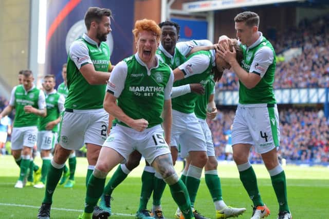 Simon Murray celebrates scoring Hibs first goal in their victory at Ibrox. Picture: SNS.