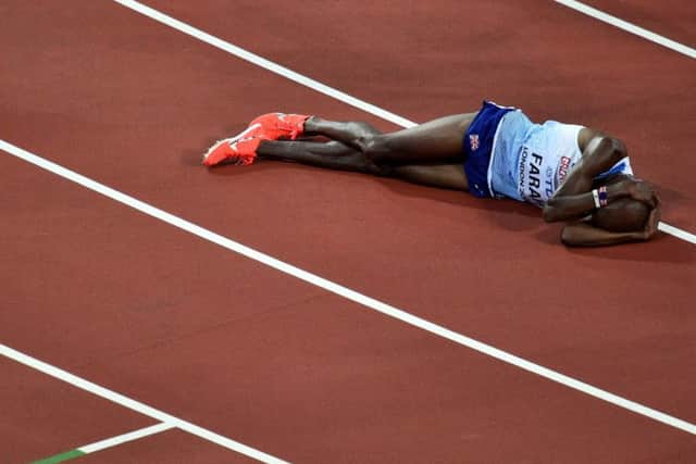Sir Mo Farah lies anguished after finishing second in the 5,000m. Picture: Getty.