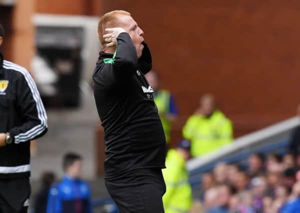 Hibs manager Neil Lennon cups his ears following Simon Murray's goal. Picture: SNS/Alan Harvey