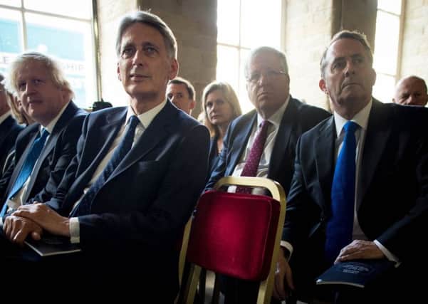 Chancellor Philip Hammond (front left) has been accused of caving to hard line Brexiteers. Picture: Stefan Rousseau/PA Wire