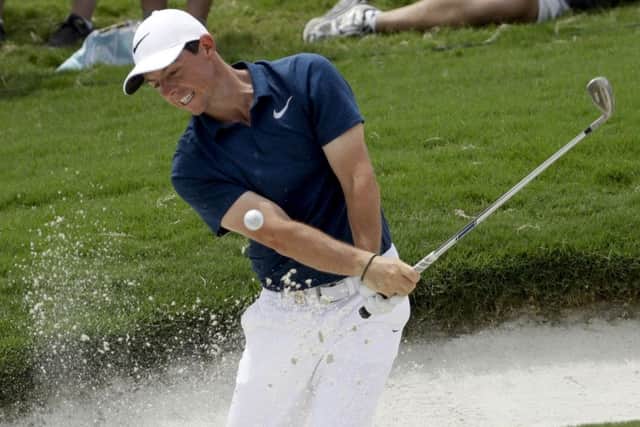 Rory McIlroy hits his shot from the bunker on the 15th hole during the final round of the US PGA Championship. Picture: AP.