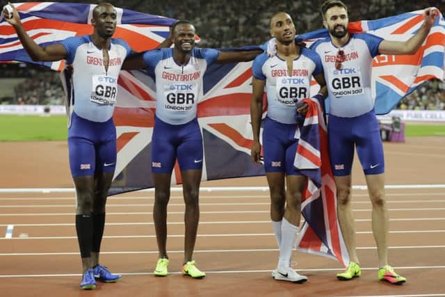 Dwayne Cowan, Rabah Yousif, Matthew Hudson-Smith and Martyn Rooney celebrate aftwer winning bronze. Picture: AP.