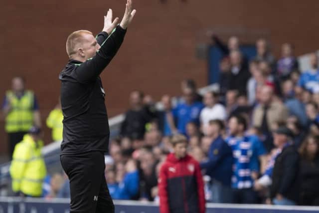 Neil Lennon faces the Ibrox main stand as he celebrates Simon Murray's goal. Picture: SNS Group
