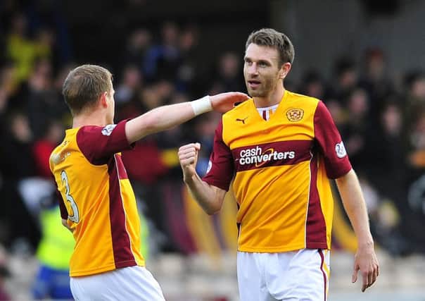 Stephen McManus, right, has decided to hang up his boots. Picture: Robert Perry