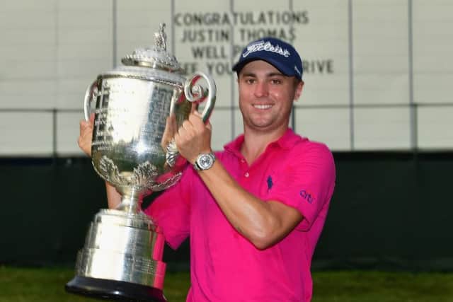 Justin Thomas poses with the trophy following his two-shot victory in the US PGA Championship. Picture: Getty.